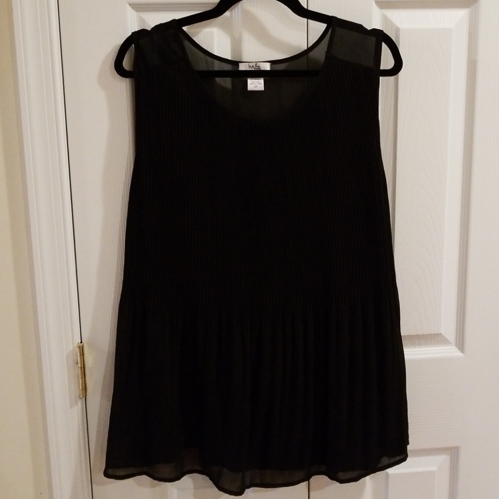 Black pleated peplum top